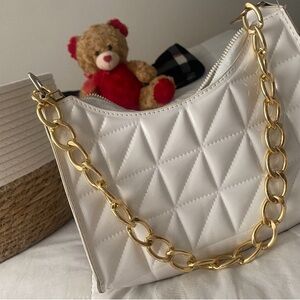 Elegant White Quilted Bag with Gold Chain